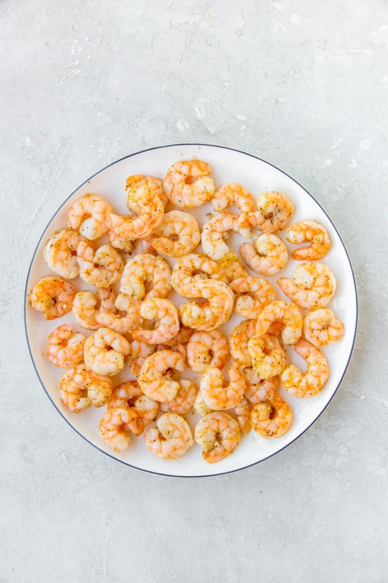 air fryer garlic shrimp on a white plate.