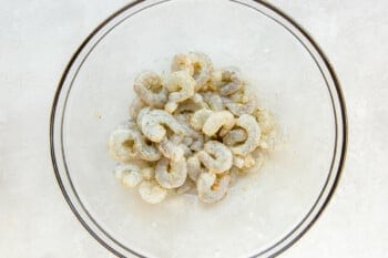 raw shrimp in a glass bowl.