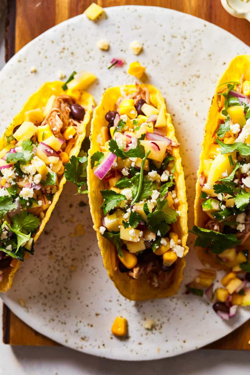 shredded chicken tacos with mango salsa