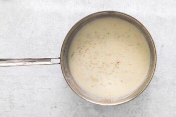 parmesan cream sauce in a skillet.