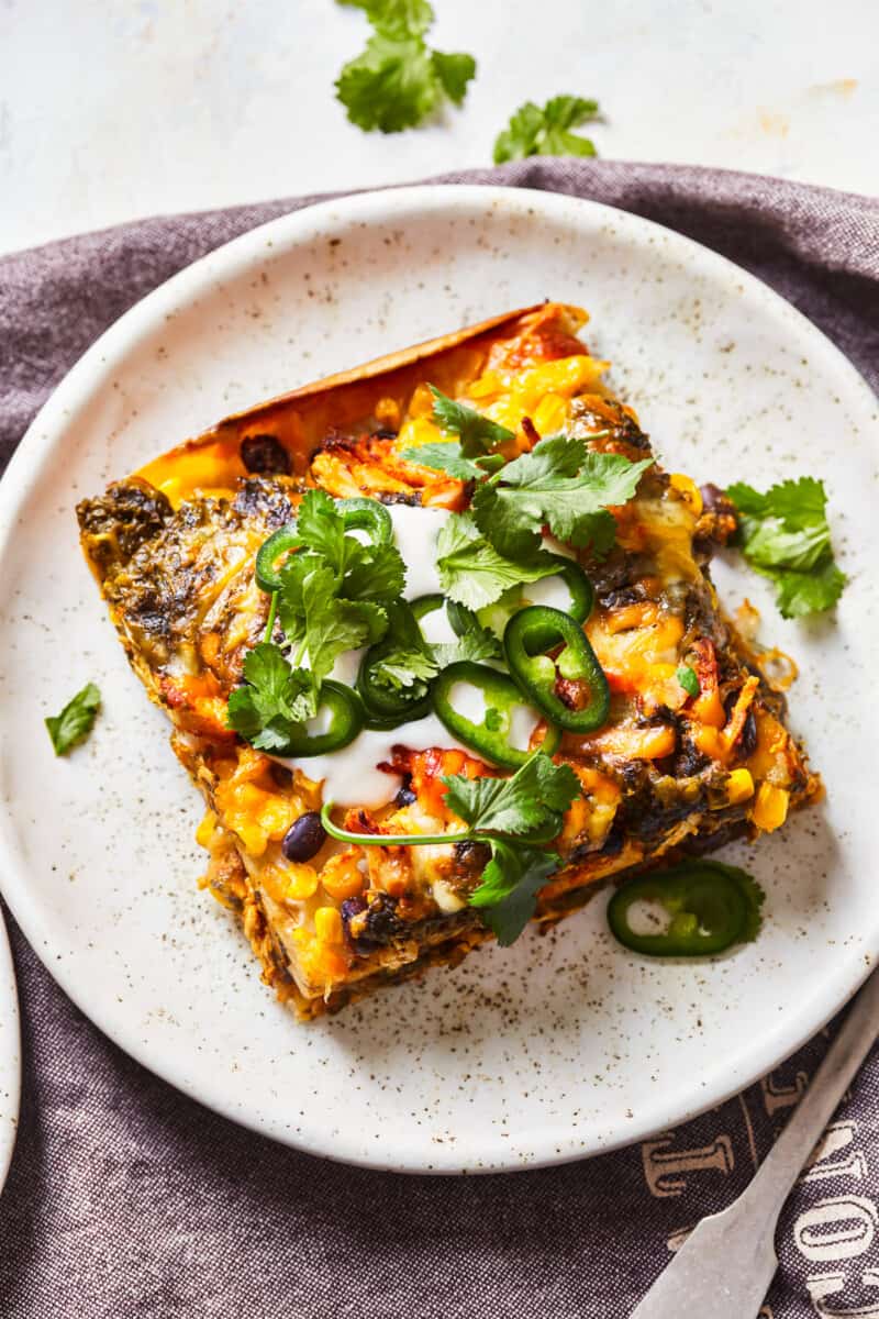 mexican lasagna with tortillas on a plate