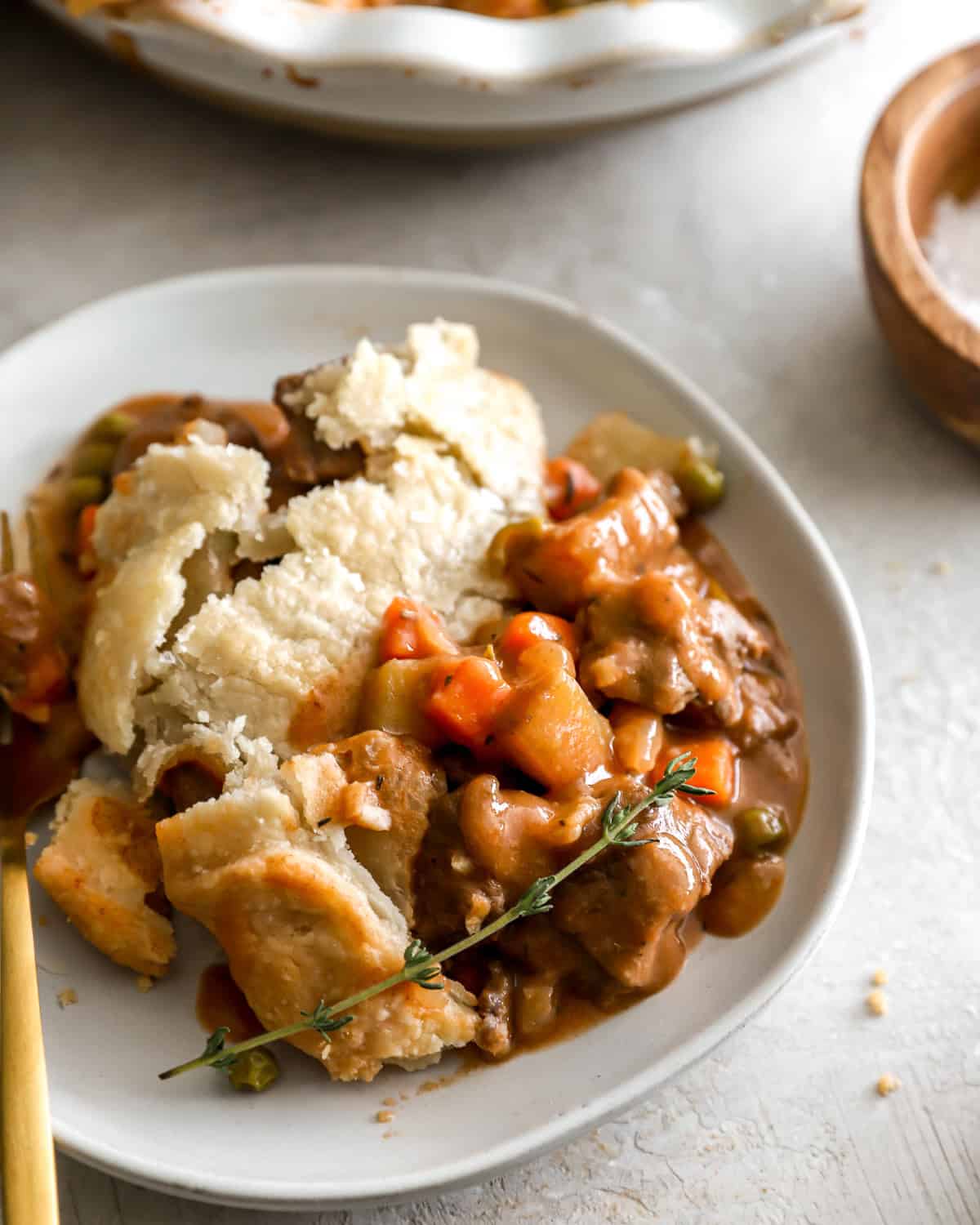 a serving of beef pot pie in a bowl.