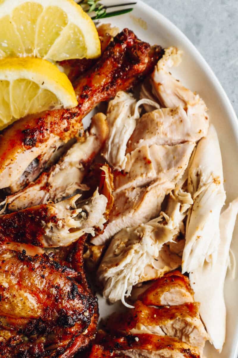 close up on pieces of grilled beer can chicken