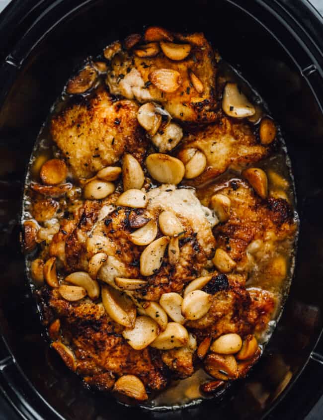 overhead view of 40 clove garlic chicken in a crockpot