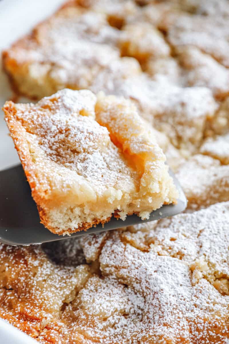 slice of gooey butter cake on a spatula