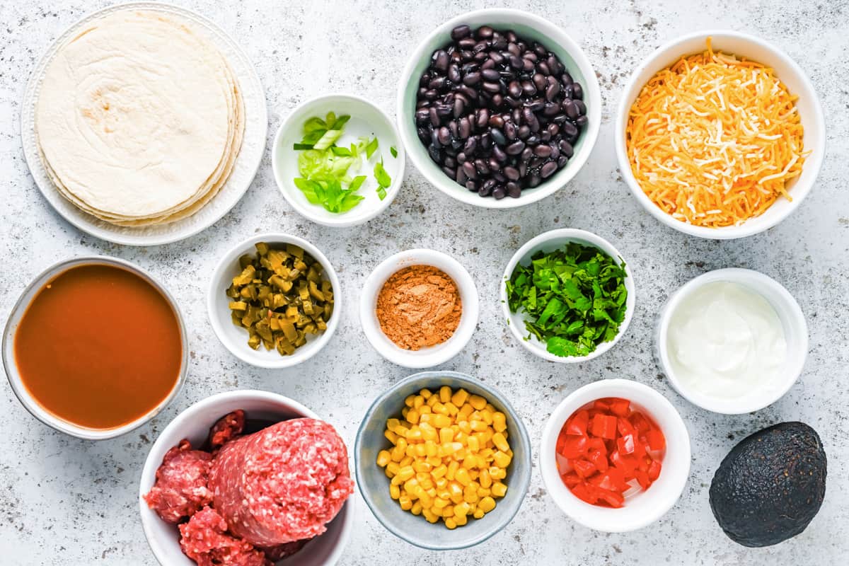 overhead view of ingredients for enchilada cups.