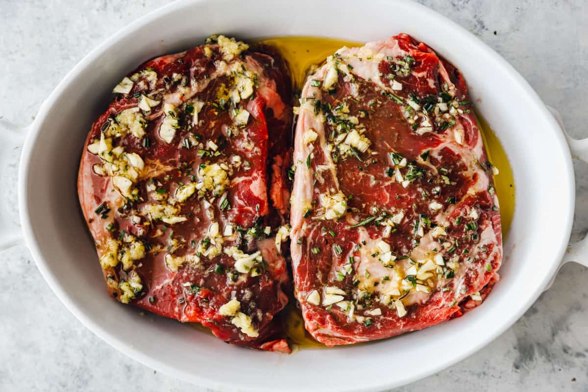 seasoning ribeye steaks