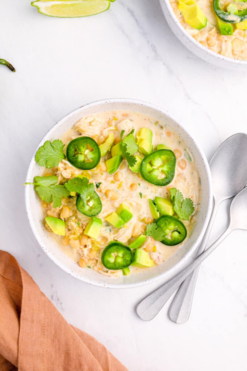 overhead view of instant pot white chicken chili in a white bowl.