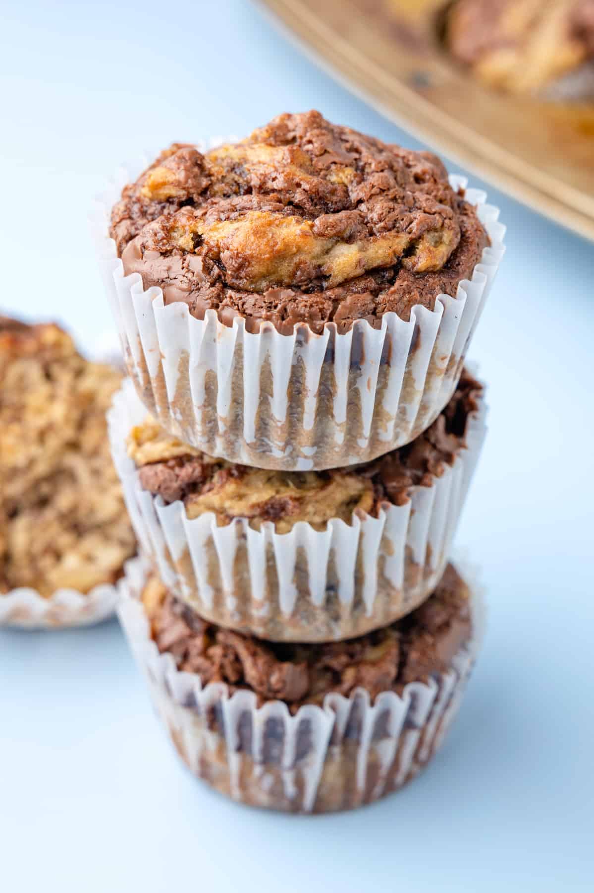 3 stacked banana nutella muffins.