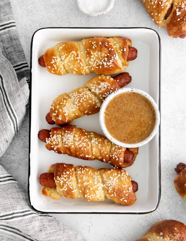 homemade pretzel dogs on a tray