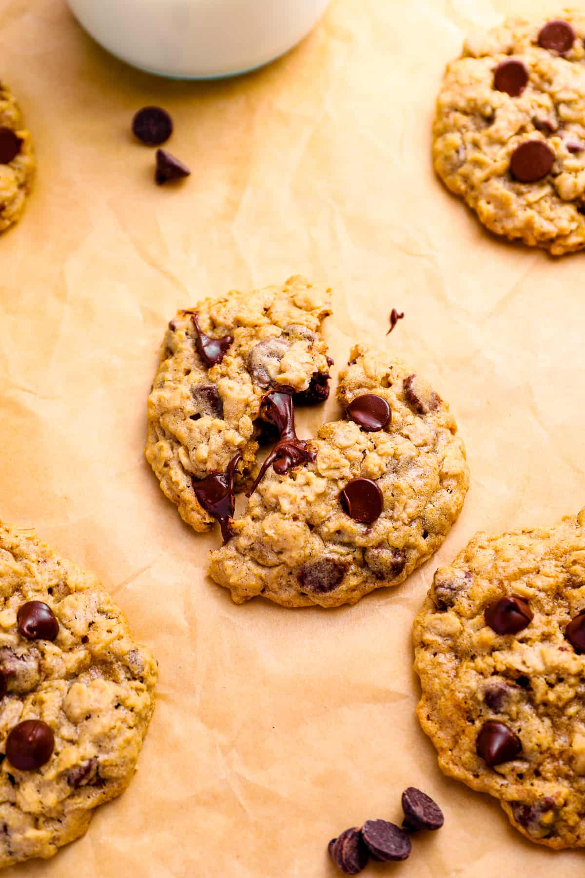 soft oatmeal chocolate chip cookies on parchment