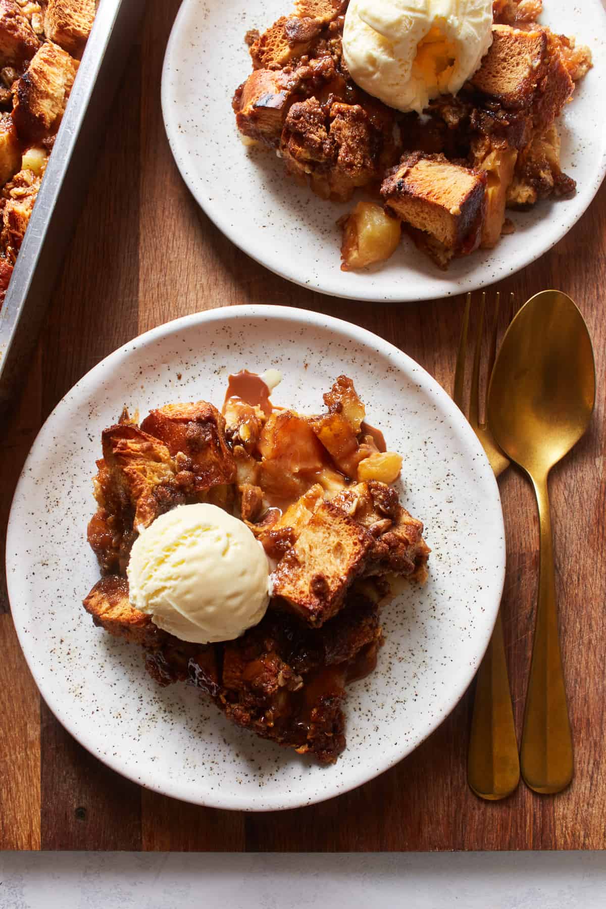 plates of caramel apple pie bread pudding