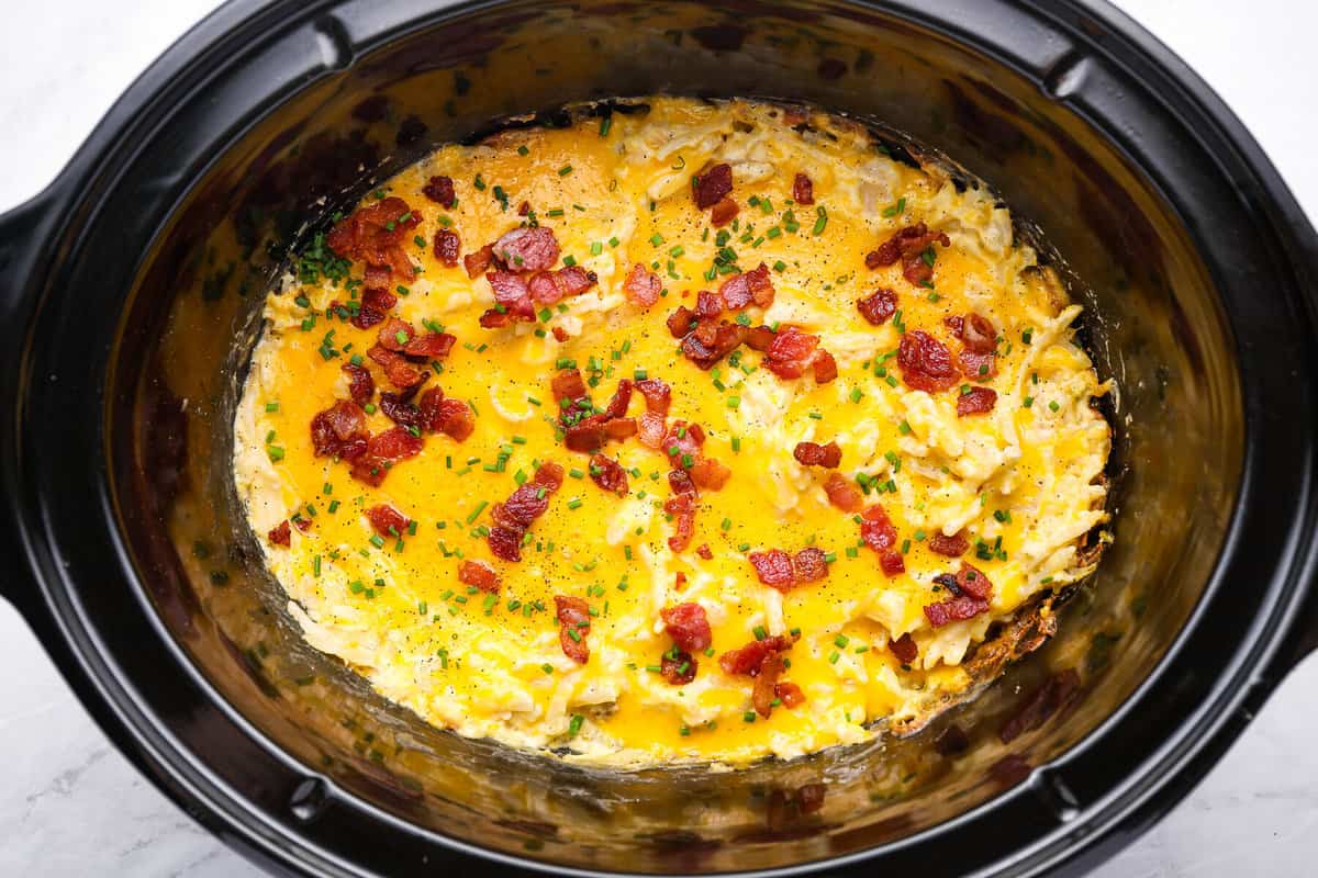 overhead view of crockpot potato casserole in a crockpot.