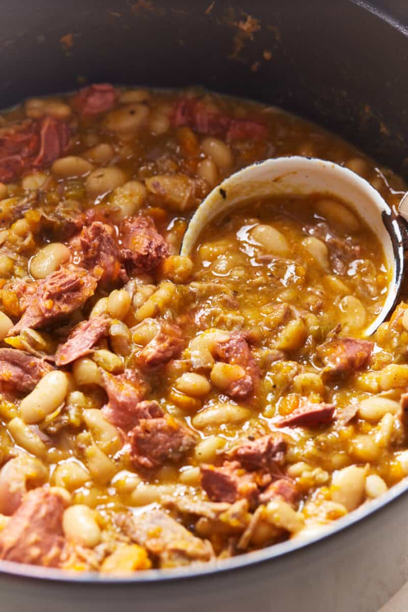 scooping soup out of a pot