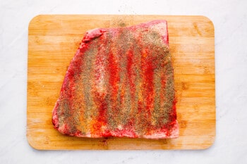 seasoned brisket on a cutting board