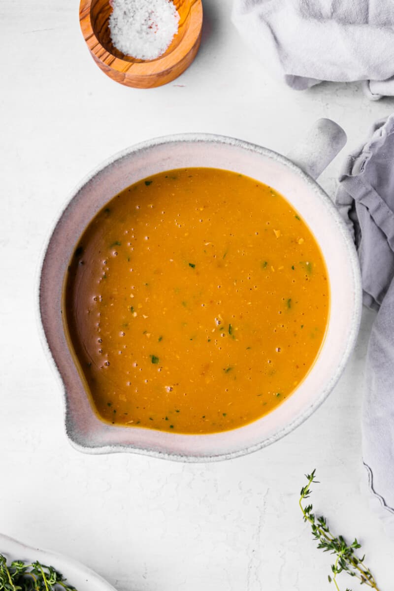 turkey gravy in a white gravy boat.