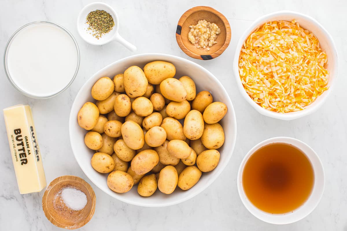 overhead view of ingredients for instant pot scalloped potatoes in individual bowls.