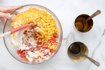 partially mixed fiesta ranch dip in a glass bowl.