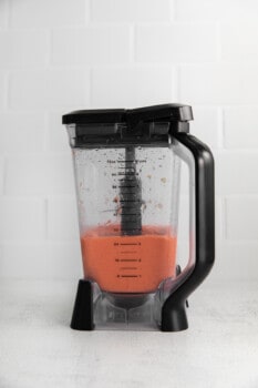 blended strawberry mango smoothie in a blender.