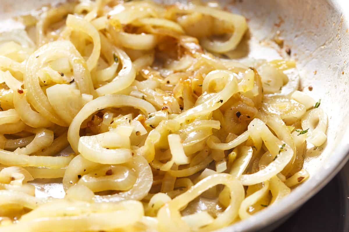 partially caramelized onions in a pan.