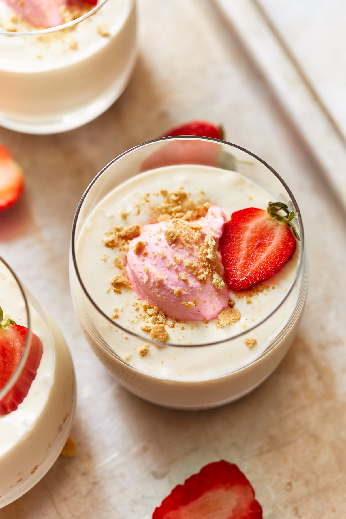 three-quarters view of no bake cheesecake cups.