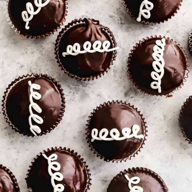 overhead view of hostess cupcakes on a marble counter.