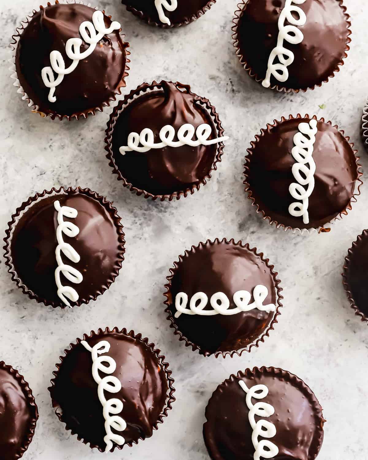 overhead view of homemade hostess cupcakes on a marble counter.