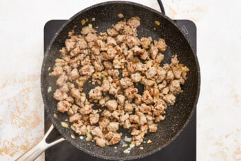 browning sausage in a skillet