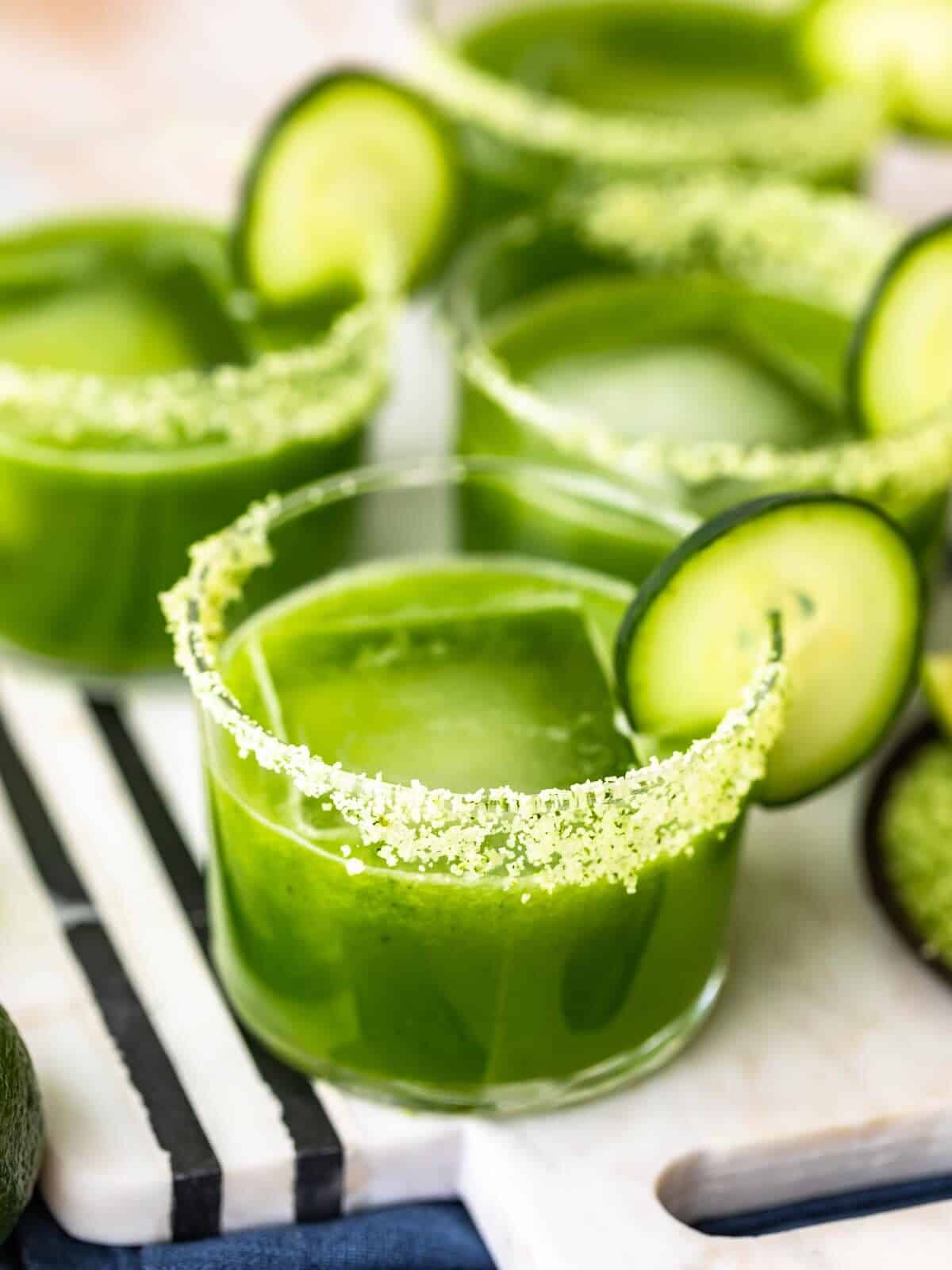 Cucumber Jalapeno Margaritas are the perfect mix of fresh and fun. This Spicy Cucumber Margarita recipe has the best flavor! Make this spicy margarita recipe for Cinco de Mayo, or any summertime gathering. Everyone will love this cocktail!