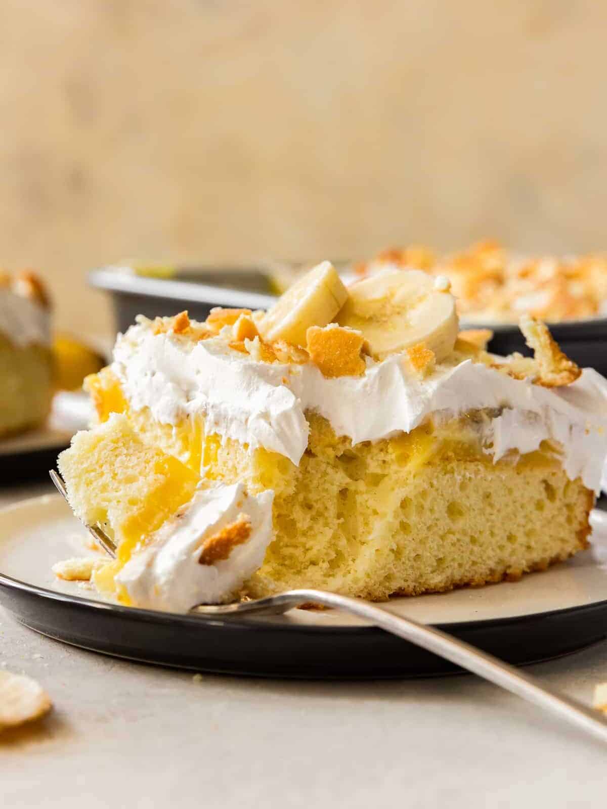 bite out of banana pudding poke cake