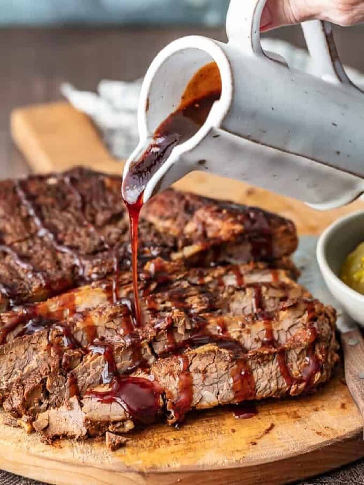 brisket drizzled with bbq sauce