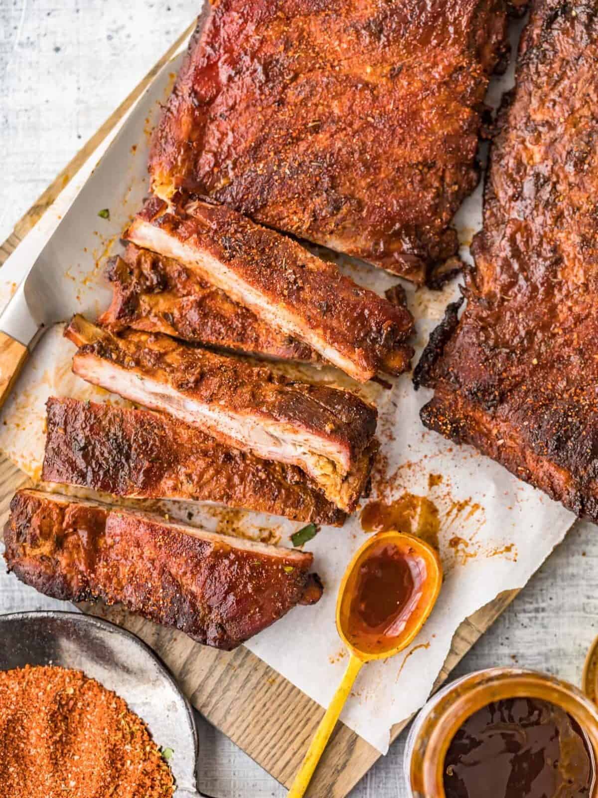 A rack of ribs cooked and sliced