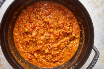 thickened sausage lentil soup in a dutch oven.