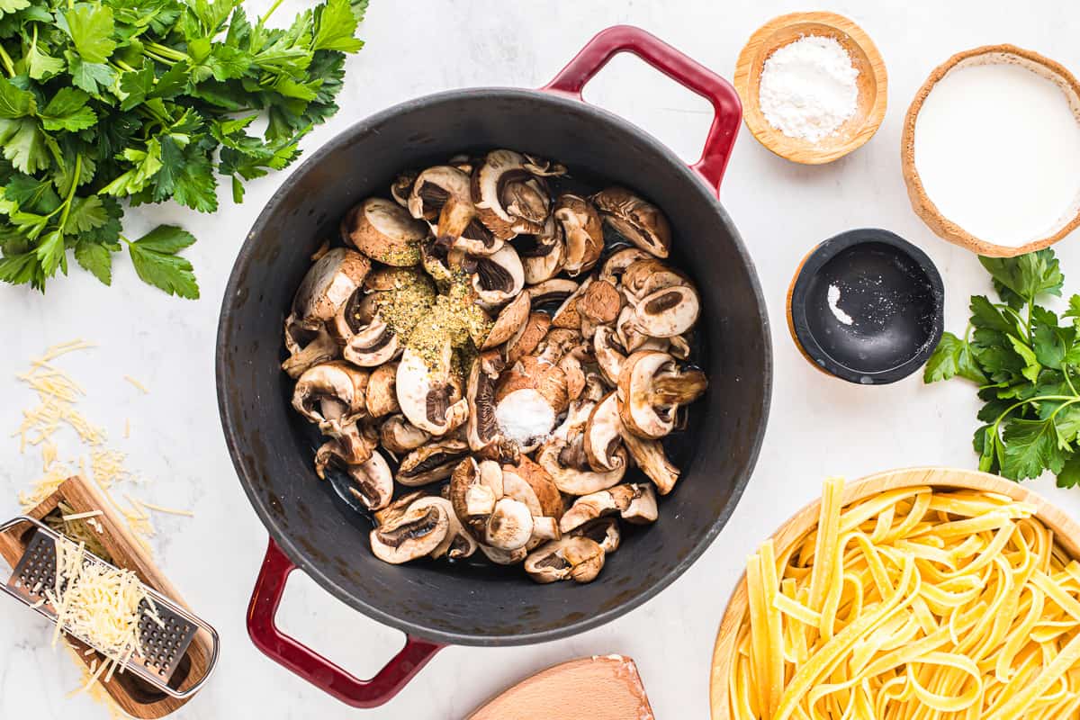 mushrooms cooking in a pot