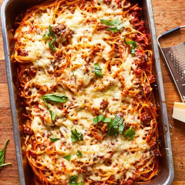 spaghetti and meatballs in a baking dish.