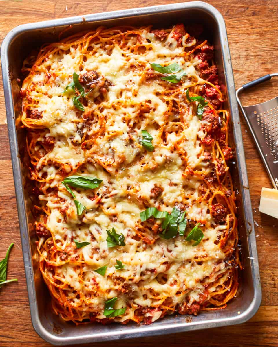 spaghetti and meatballs in a baking dish.