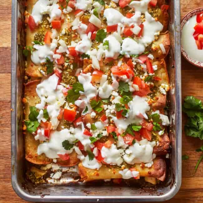 mexican enchiladas in a baking dish.