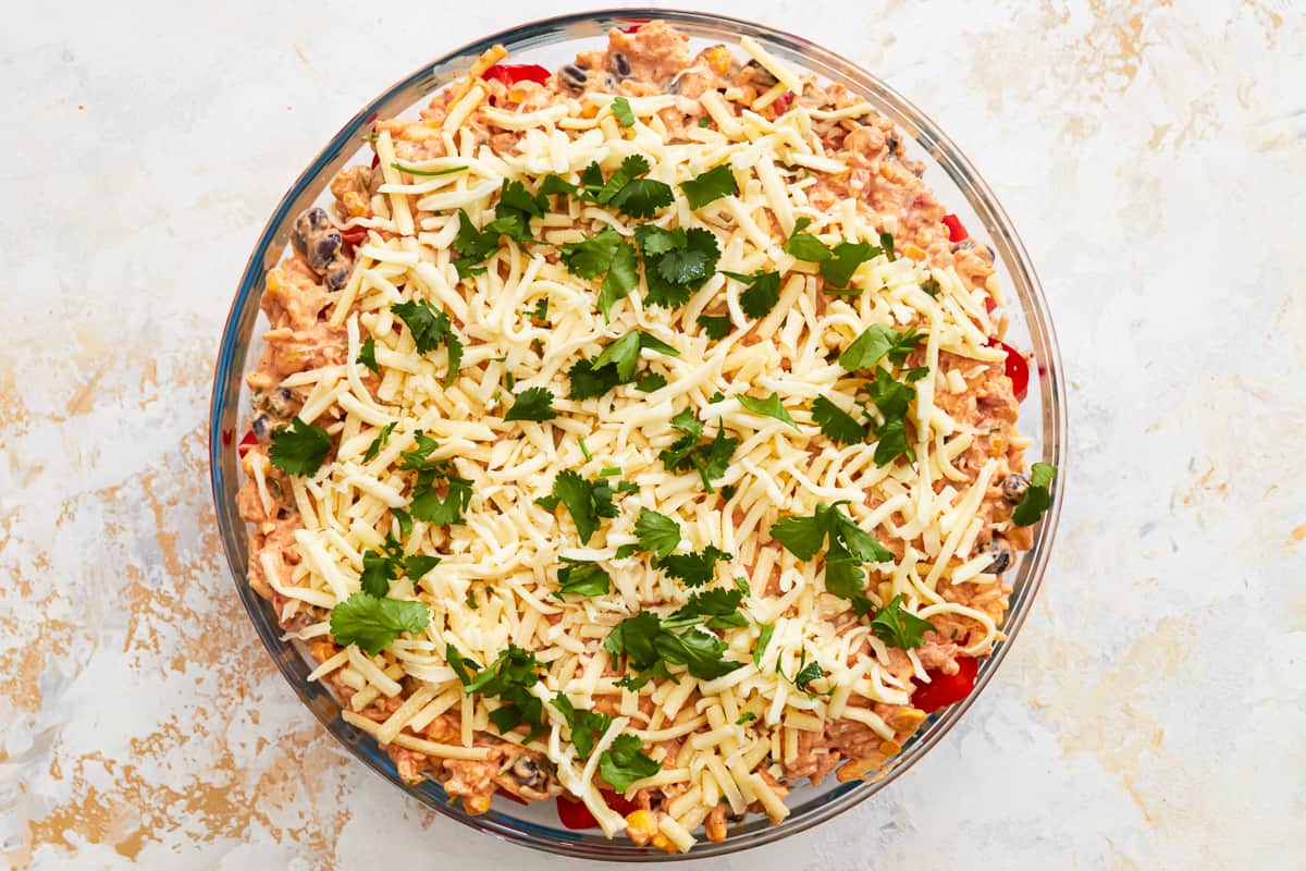 cheesy mexican casserole in a glass dish.