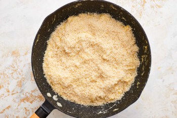 a frying pan with flour in it.