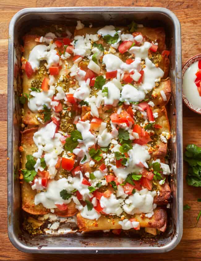 mexican enchiladas in a baking dish.