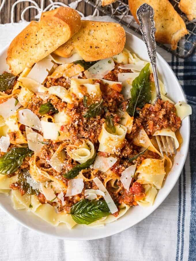 A plate of food, with Beef and noodles