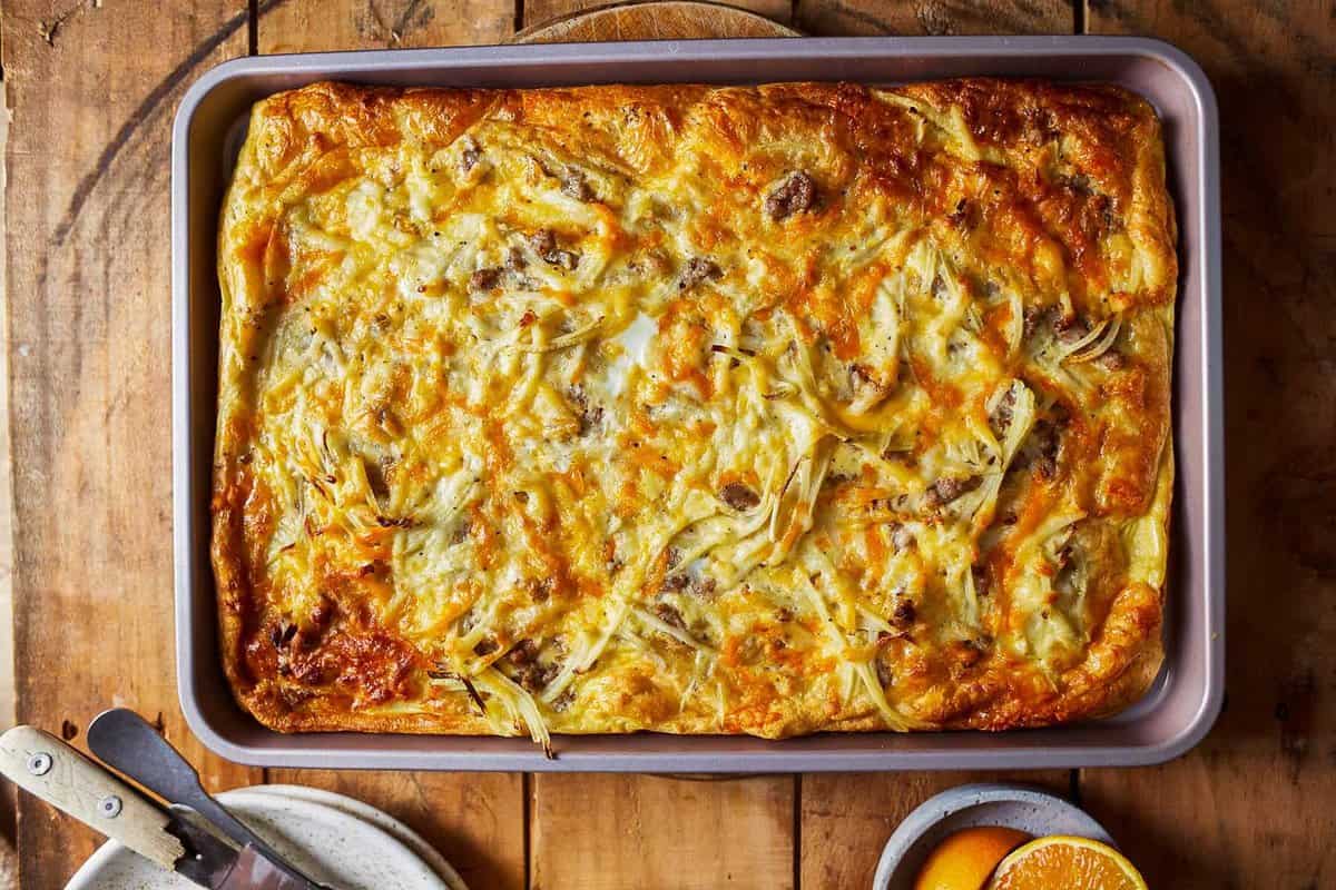 sheet pan breakfast pizza on table