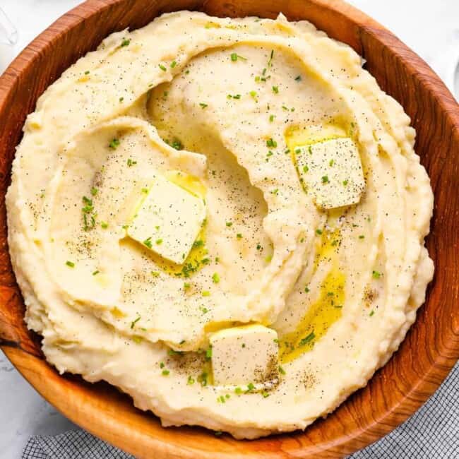 crockpot mashed potatoes with pats of butter