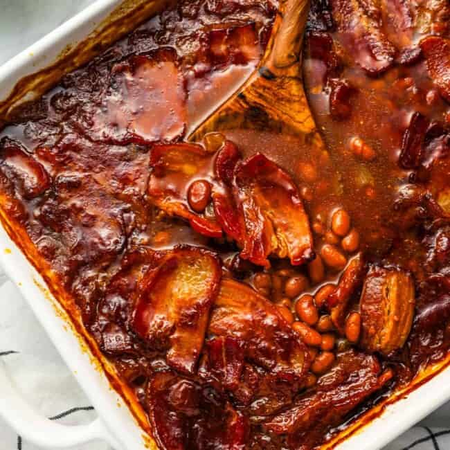 A casserole dish filled with beans and meat.