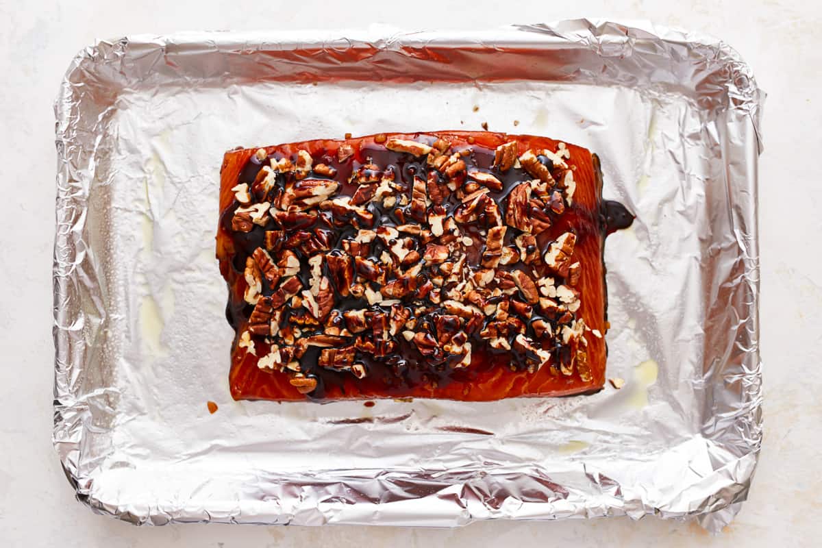 bourbon brown sugar glazed salmon on a baking sheet.