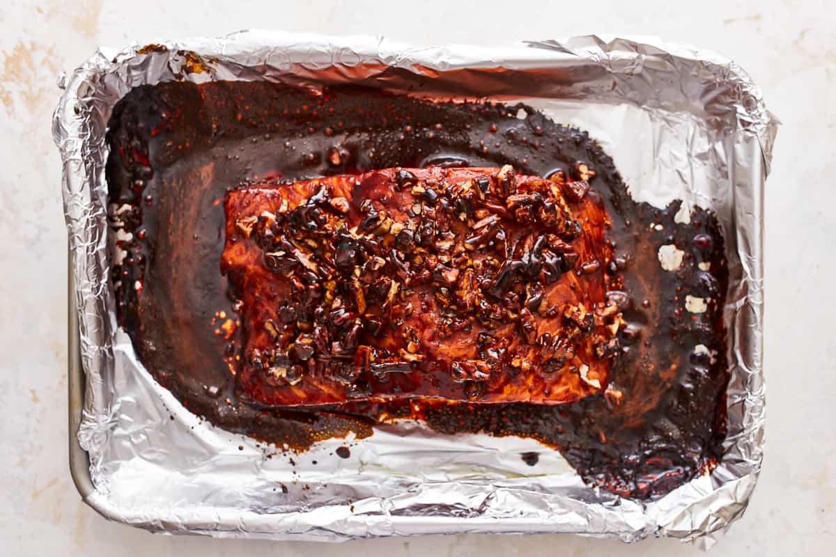 baked bourbon brown sugar salmon on a baking sheet.