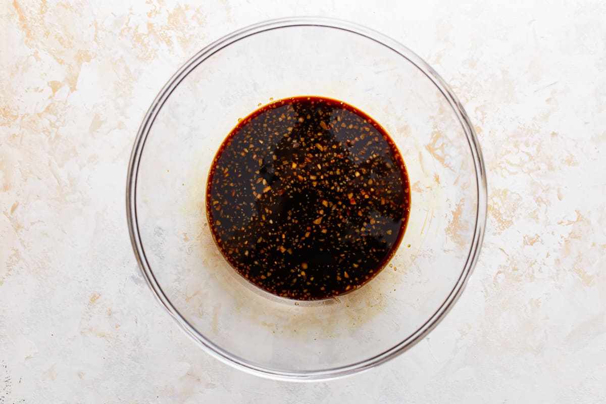 brown sugar bourbon marinade in a glass bowl.