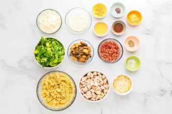 A bowl of ingredients for a pasta dish.