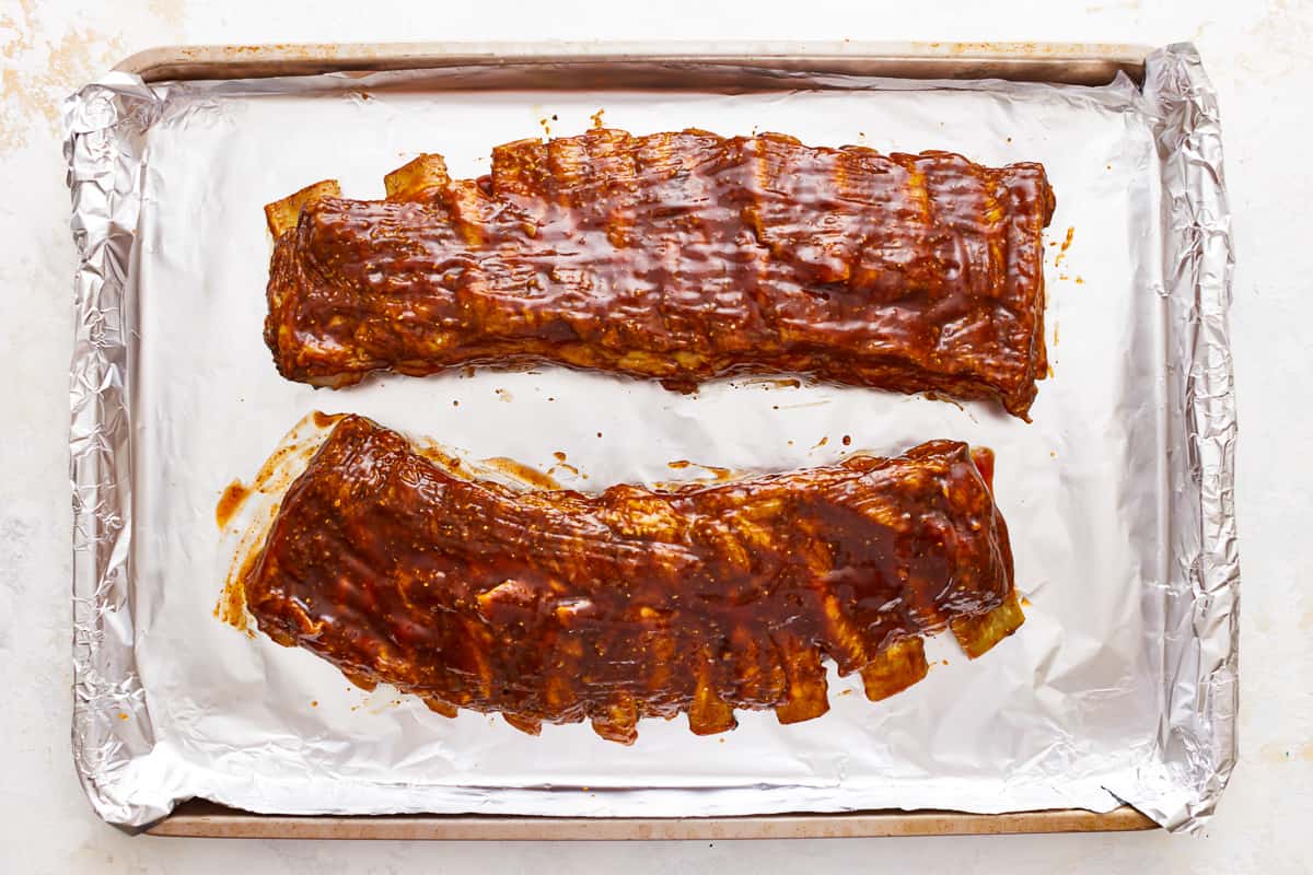 bbq ribs on a baking sheet.