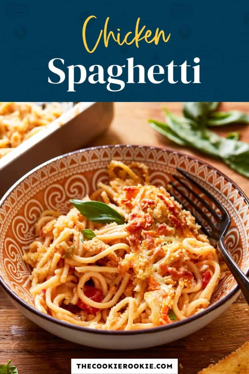 Chicken spaghetti in a bowl with a fork.